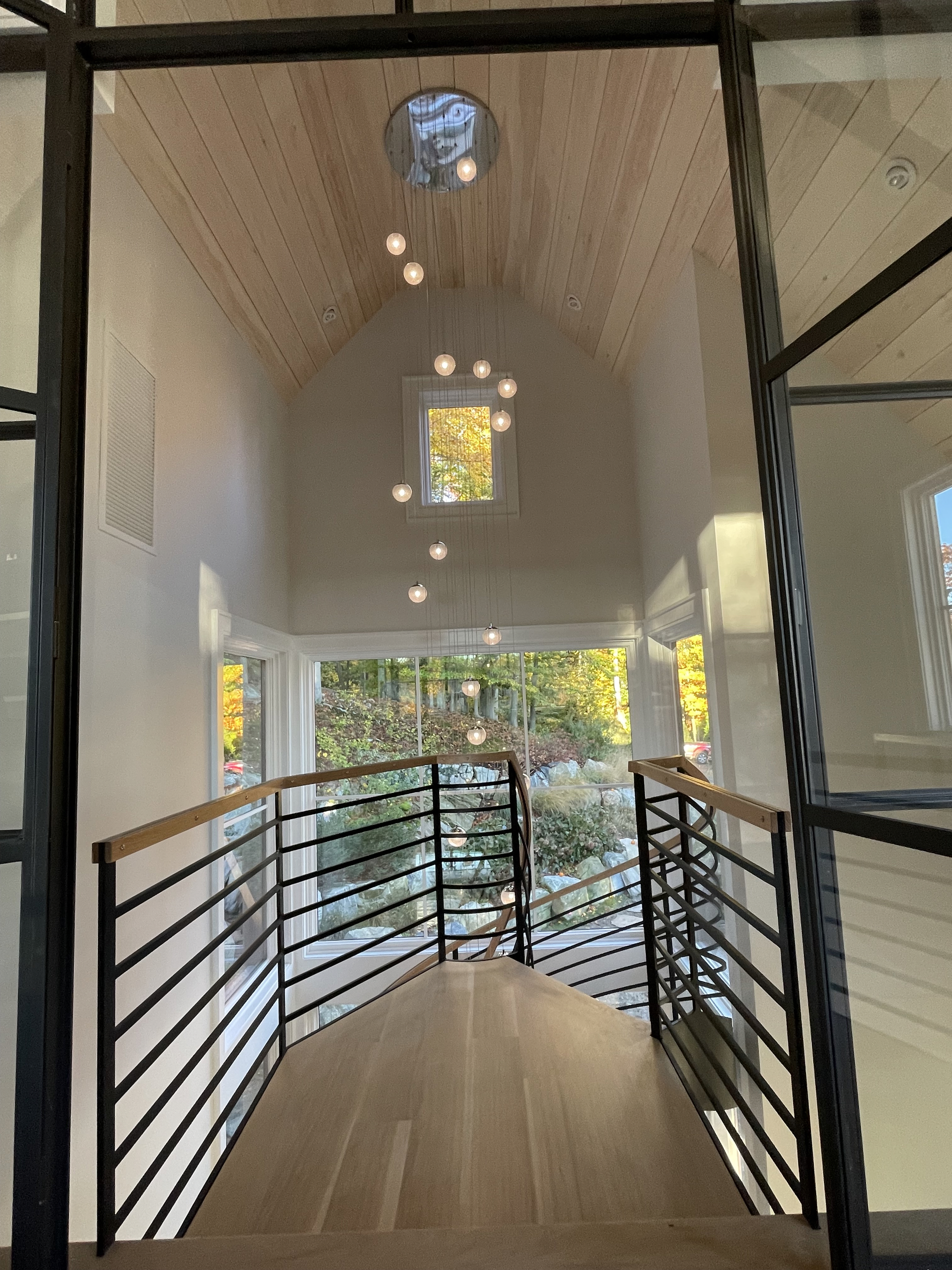 Home's Entryway With A Wooden Ceiling