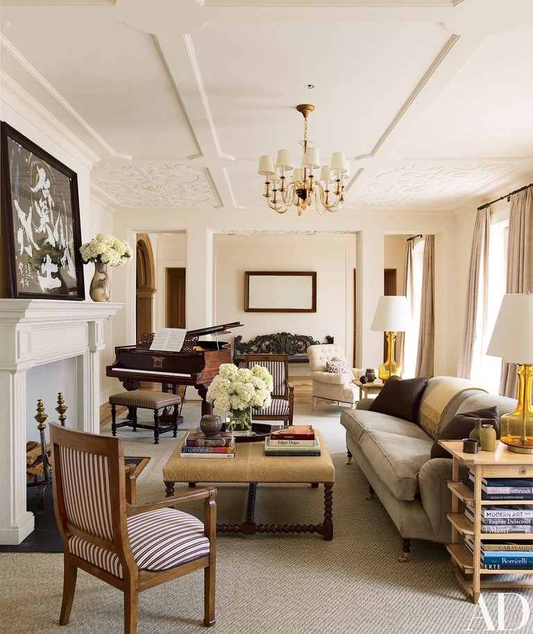 A Cozy Living Room With A Grand Piano