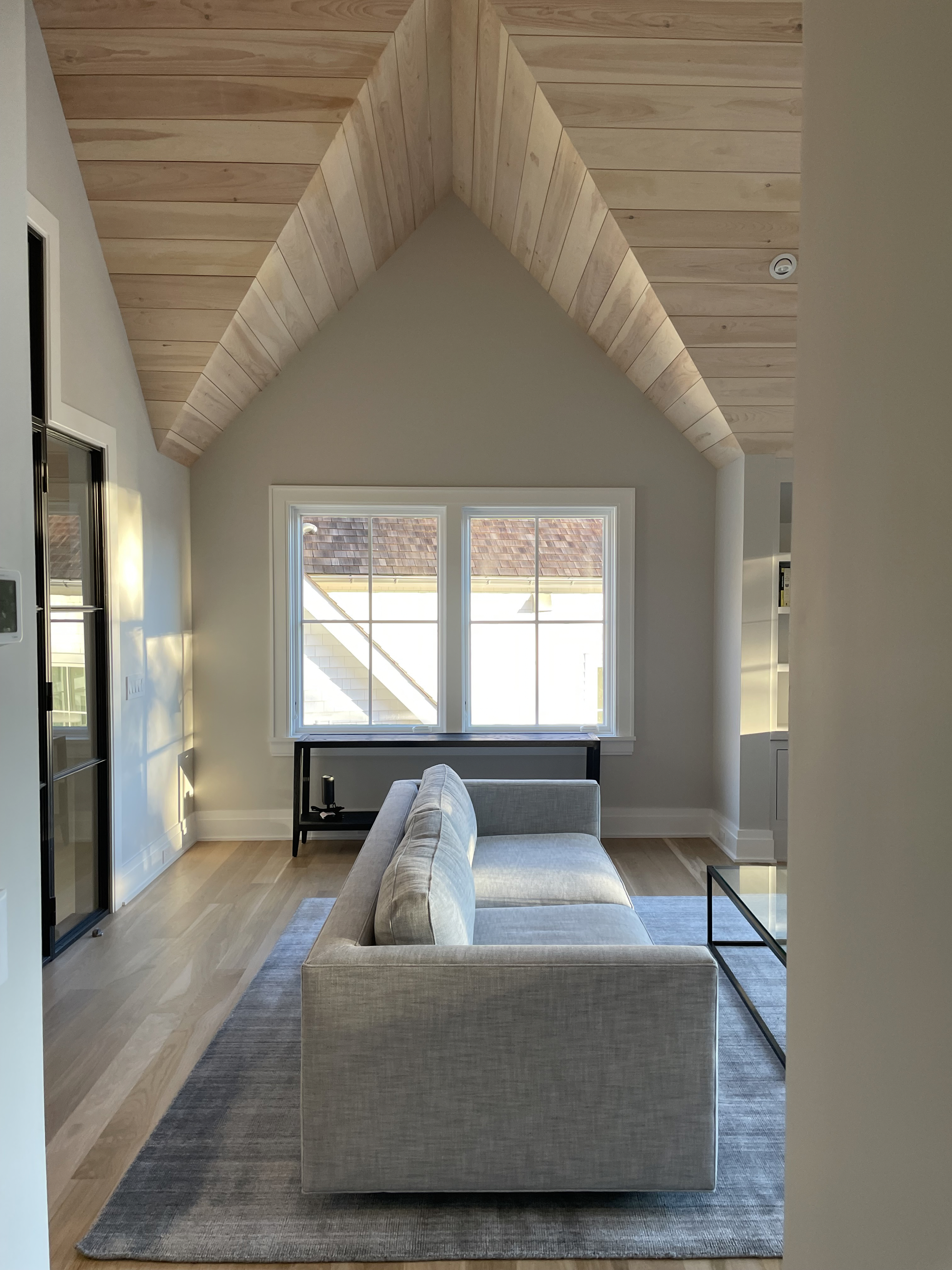 A Cozy Living Room With A Comfortable Couch