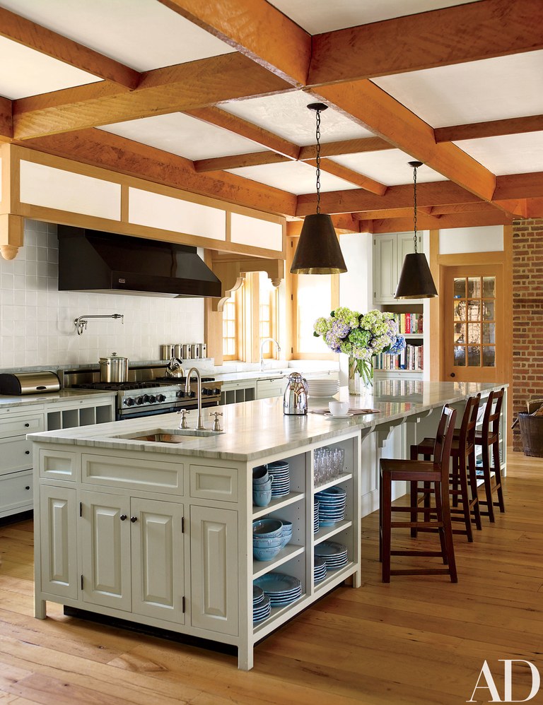 A Kitchen With Rustic Wooden Beams